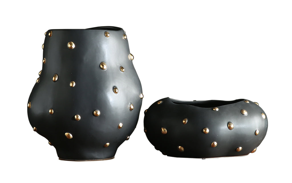 M716X02 raised dot shaped bottle